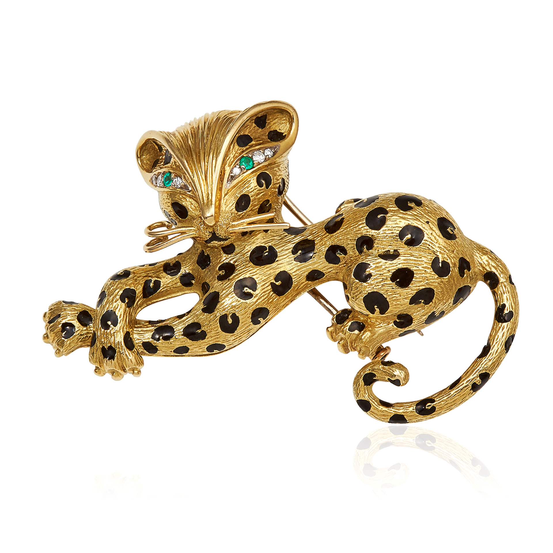 A VINTAGE EMERALD, DIAMOND AND ENAMEL LEOPARD BROOCH, FRED in 18ct yellow gold, designed as a