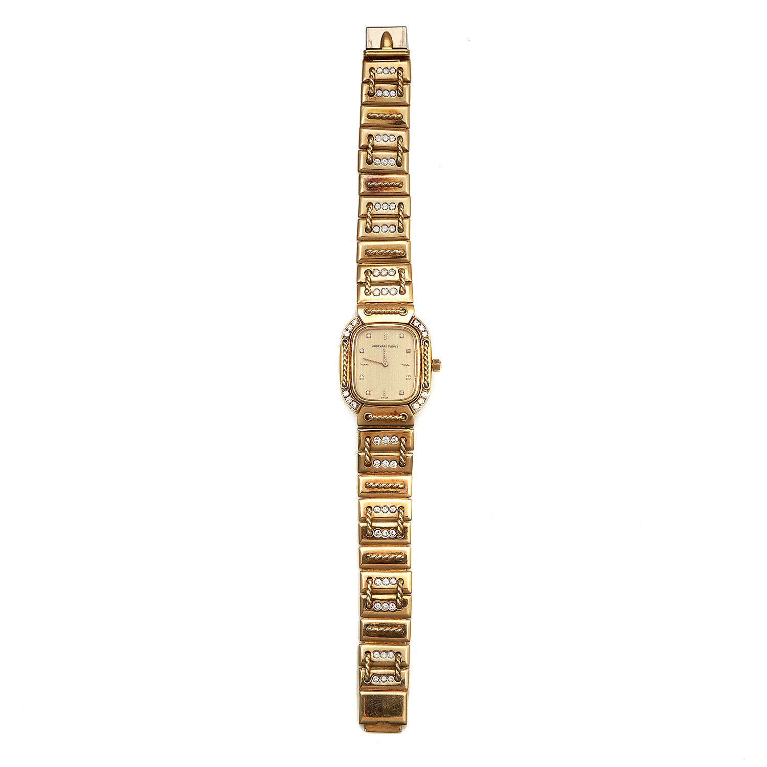 A LADIES DIAMOND WRIST WATCH, AUDEMARS PIGUET in 18ct yellow gold, the rounded rectangular 26mm case