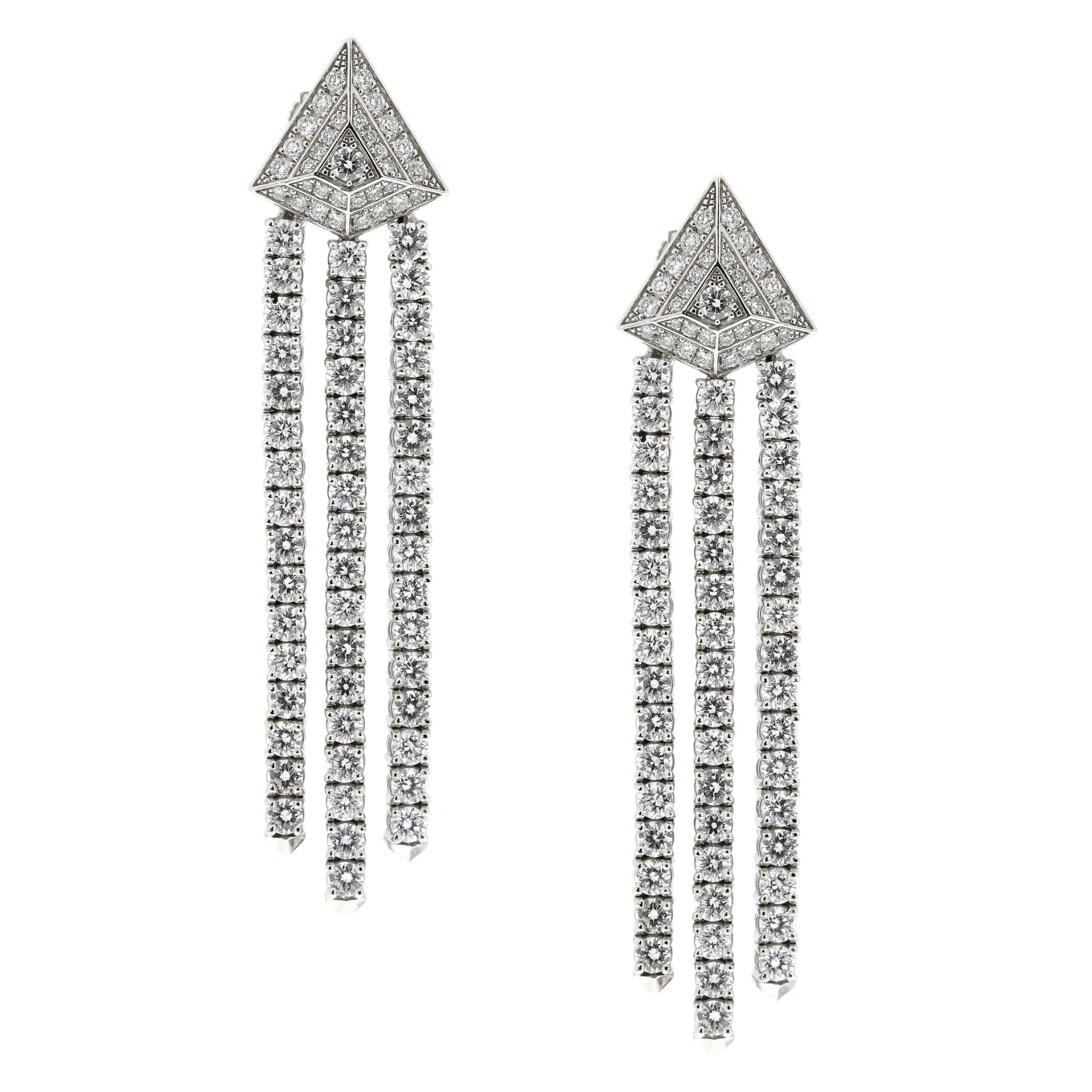 A PAIR OF DIAMOND TASSEL EARRINGS, PIAGET in 18ct white gold, each formed of a triangular motif