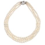 AN ANTIQUE PEARL AND DIAMOND NECKLACE in platinum or white gold, comprising three rows of one