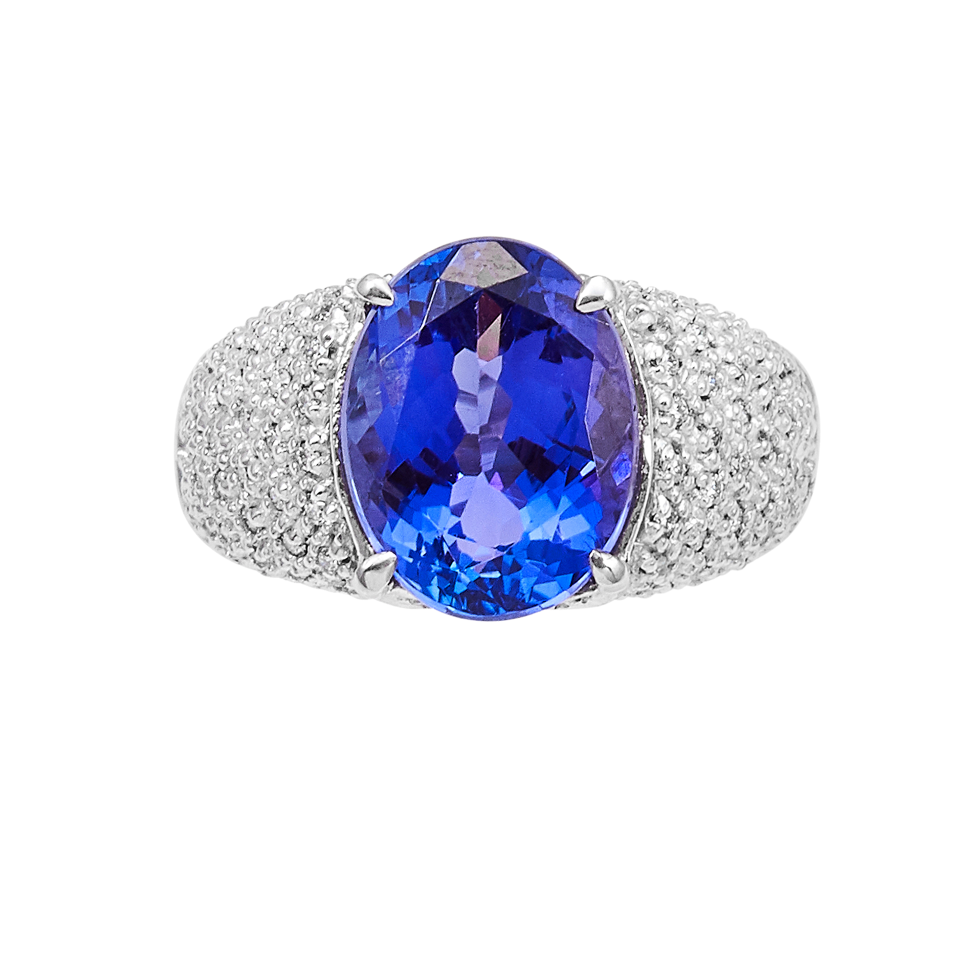 A TANZANITE AND DIAMOND RING in 18ct white gold, the oval cut tanzanite of 4.70 carats within