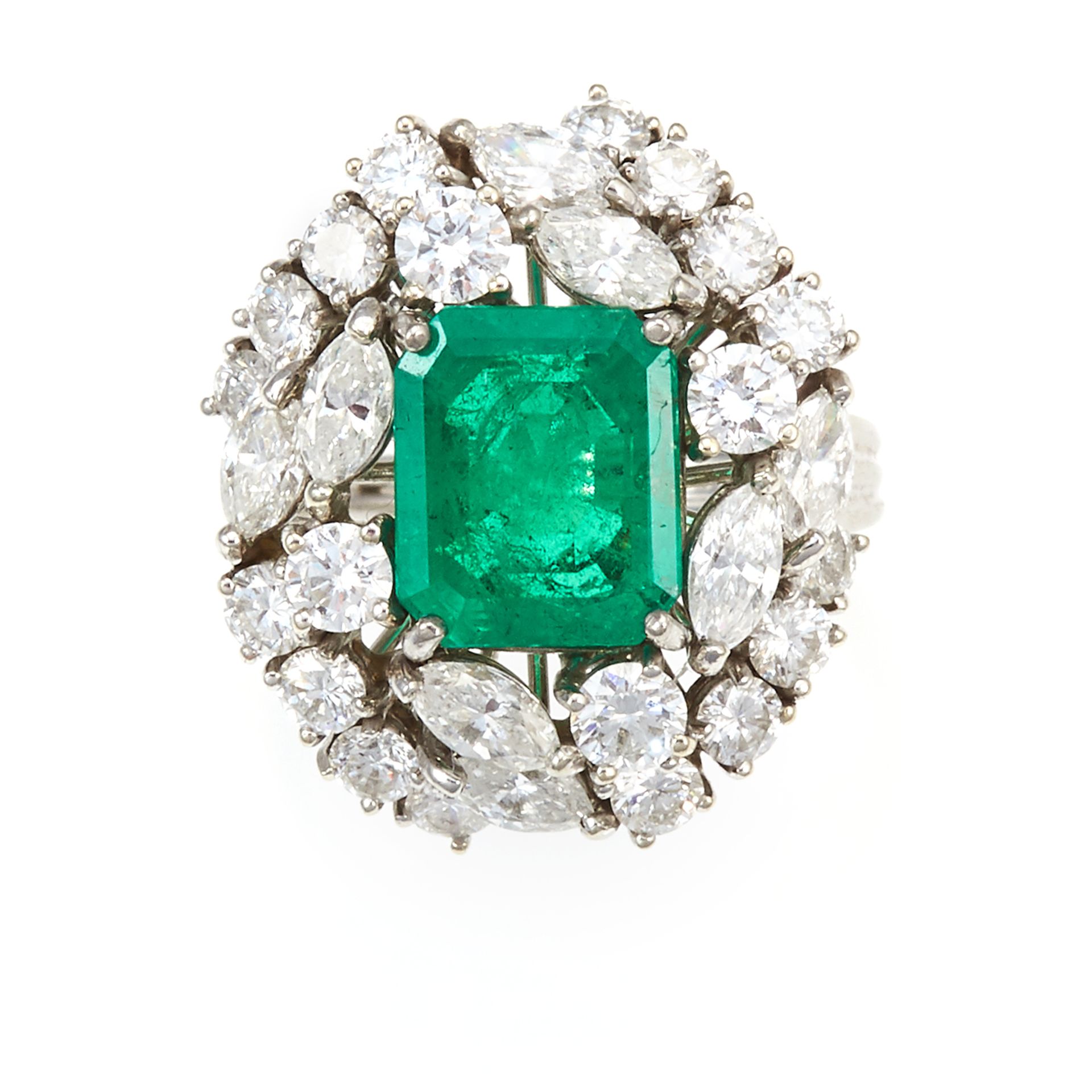 AN EMERALD AND DIAMOND DRESS RING in 18ct white gold, the step cut emerald of 3.25 carats