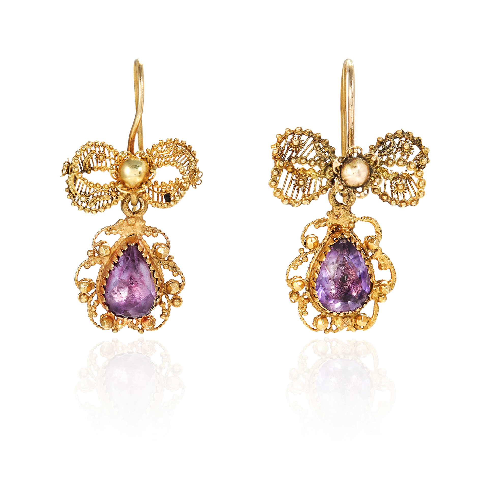 A PAIR OF ANTIQUE AMETHYST EARRINGS in high carat yellow gold, each set with a pear shaped