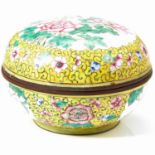 A CHINESE CLOISONNE ENAMEL BRONZE BOX of circular form, decorated in enamel with pink peonies