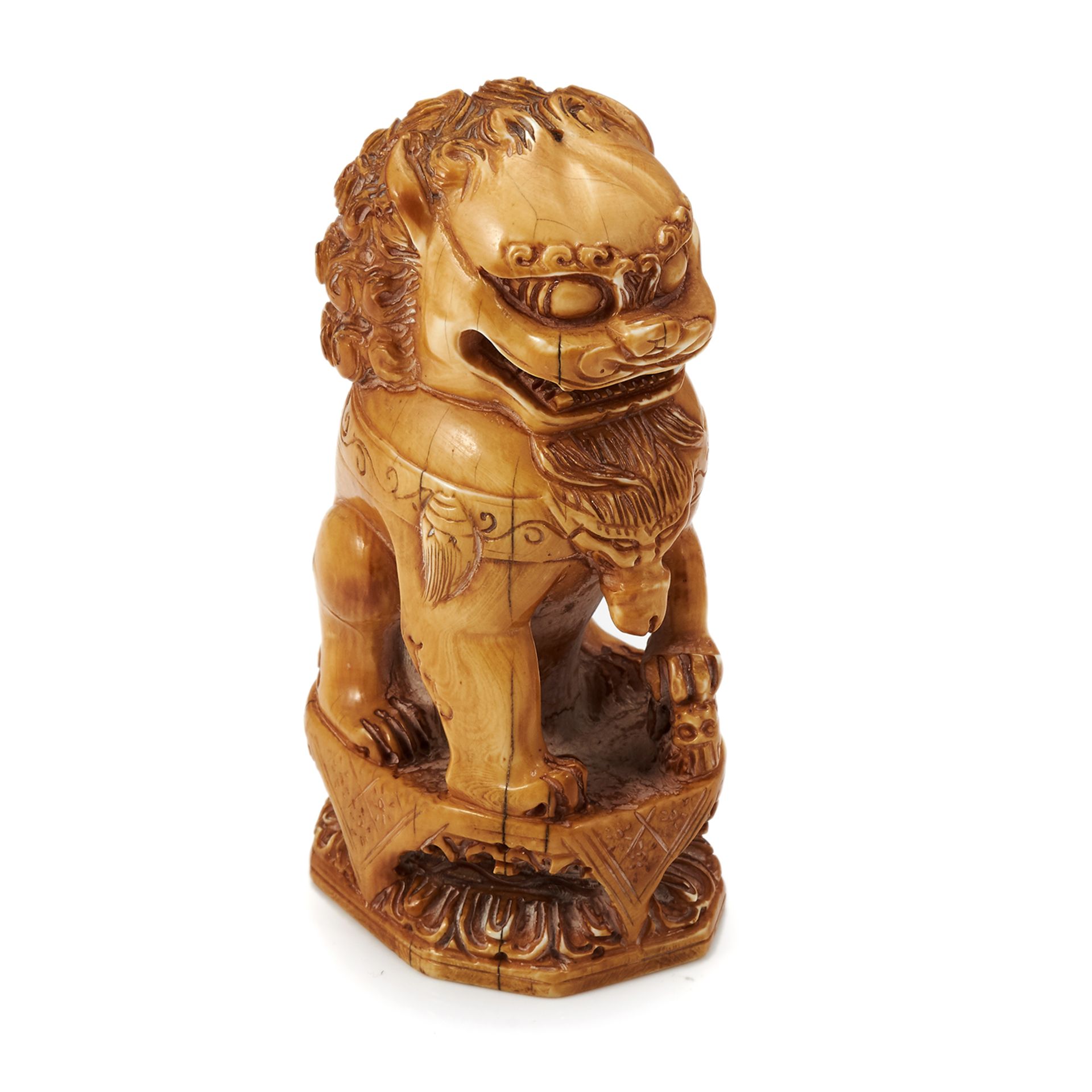 AN ANTIQUE CARVED IVORY SEAL, 19TH CENTURY depicting a seated lion atop a squared base, 10.0cm,