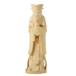 AN ANTIQUE CHINESE CARVED IVORY FIGURE, QING DYNASTY carved in detail to depict an elderly gentleman