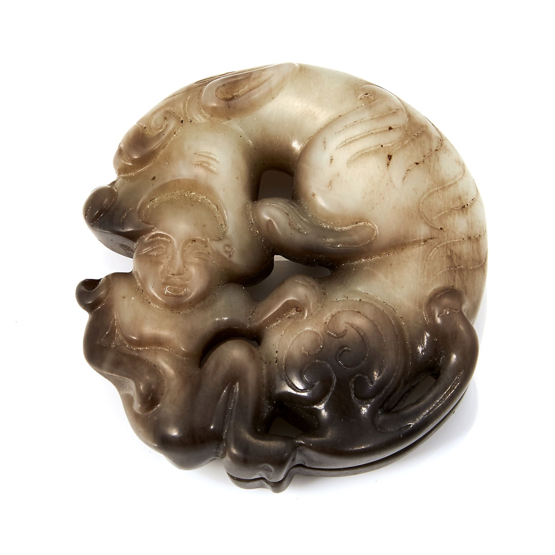 A CHINESE JADE DOG AND BABY DISC PENDANT of circular form, depicting a baby, its head held in the