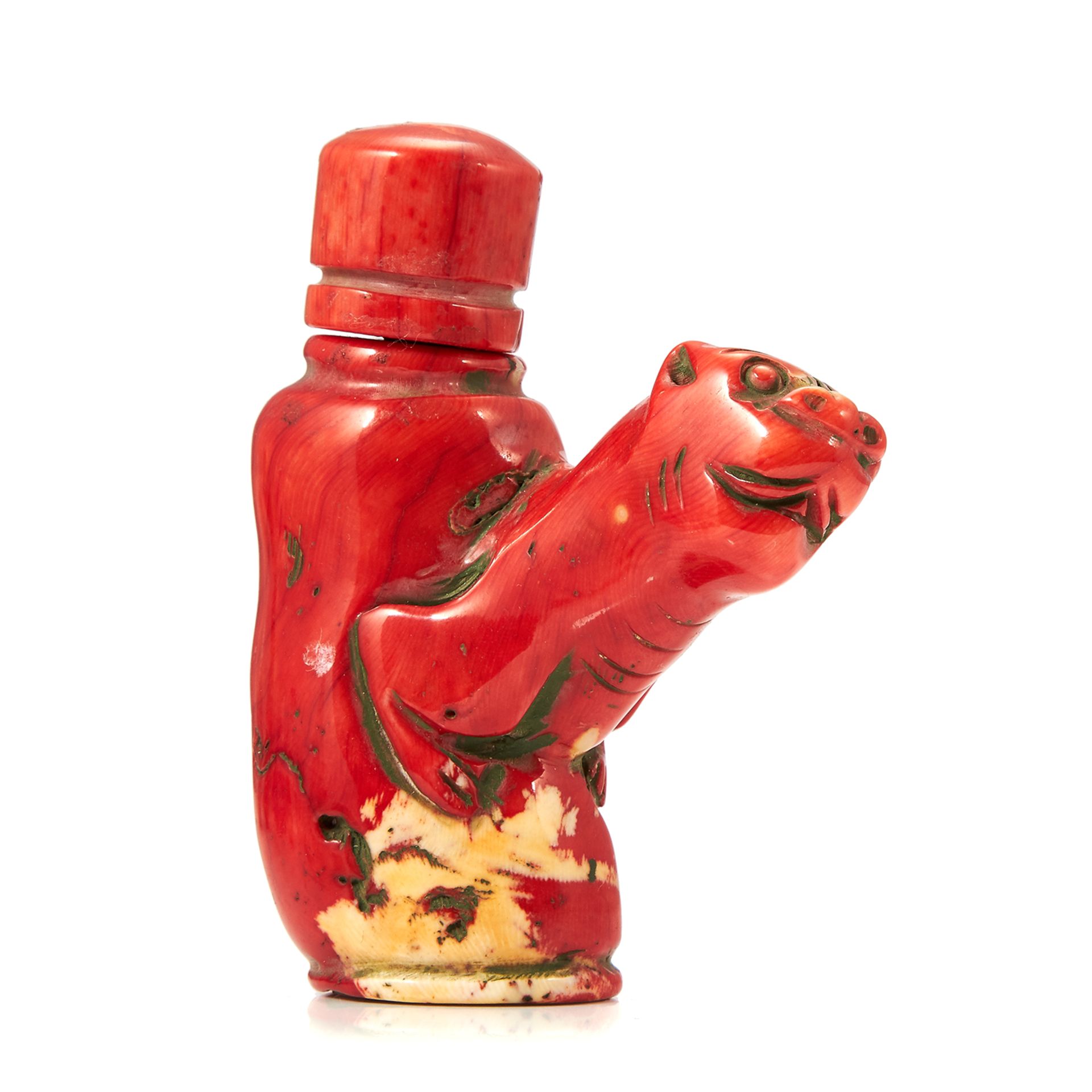 A CARVED CHINESE CORAL SNUFF BOTTLE 8.6cm.