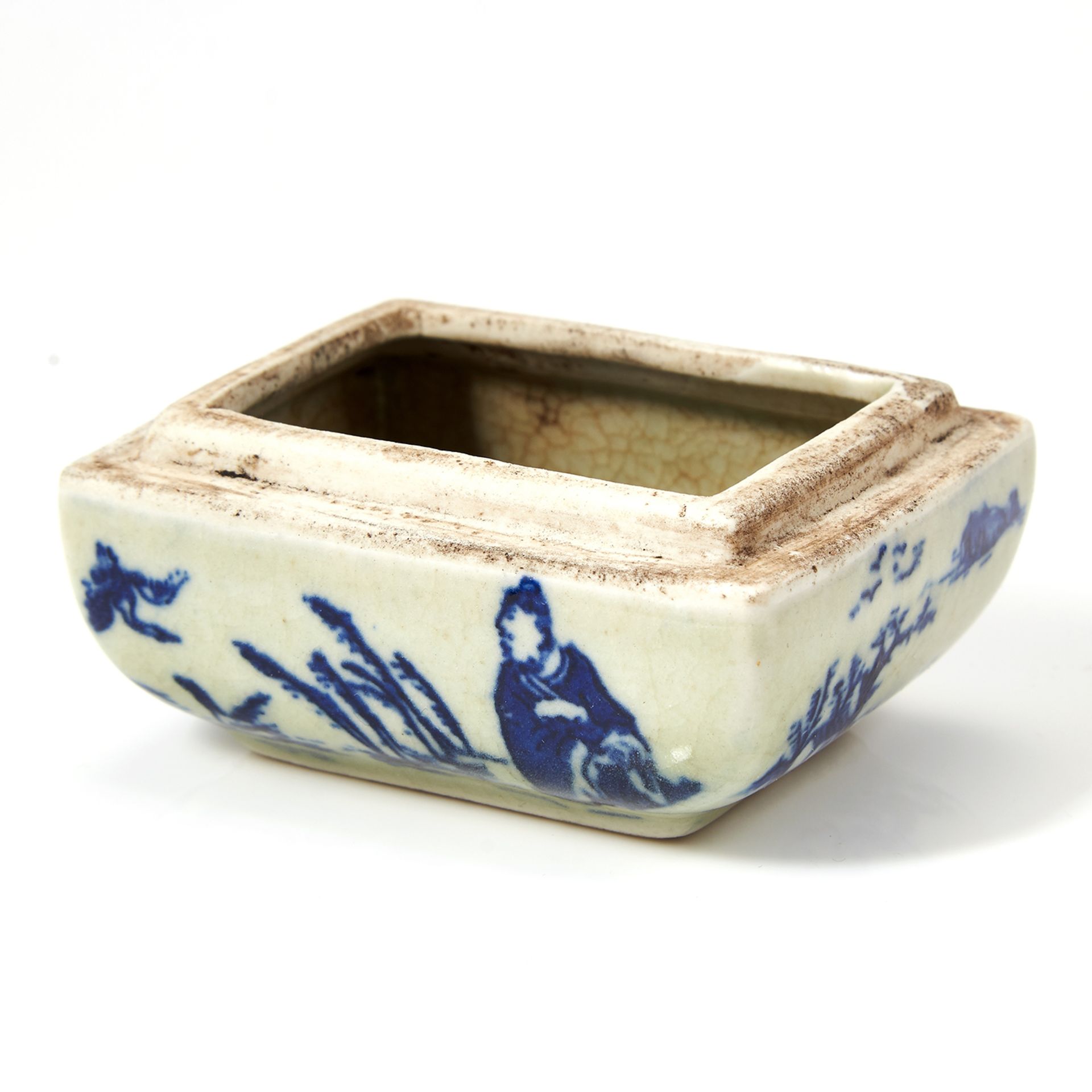 A CHINESE BLUE AND WHITE EROTIC BOX BASE rectangular form with blue and white decoration, the inside