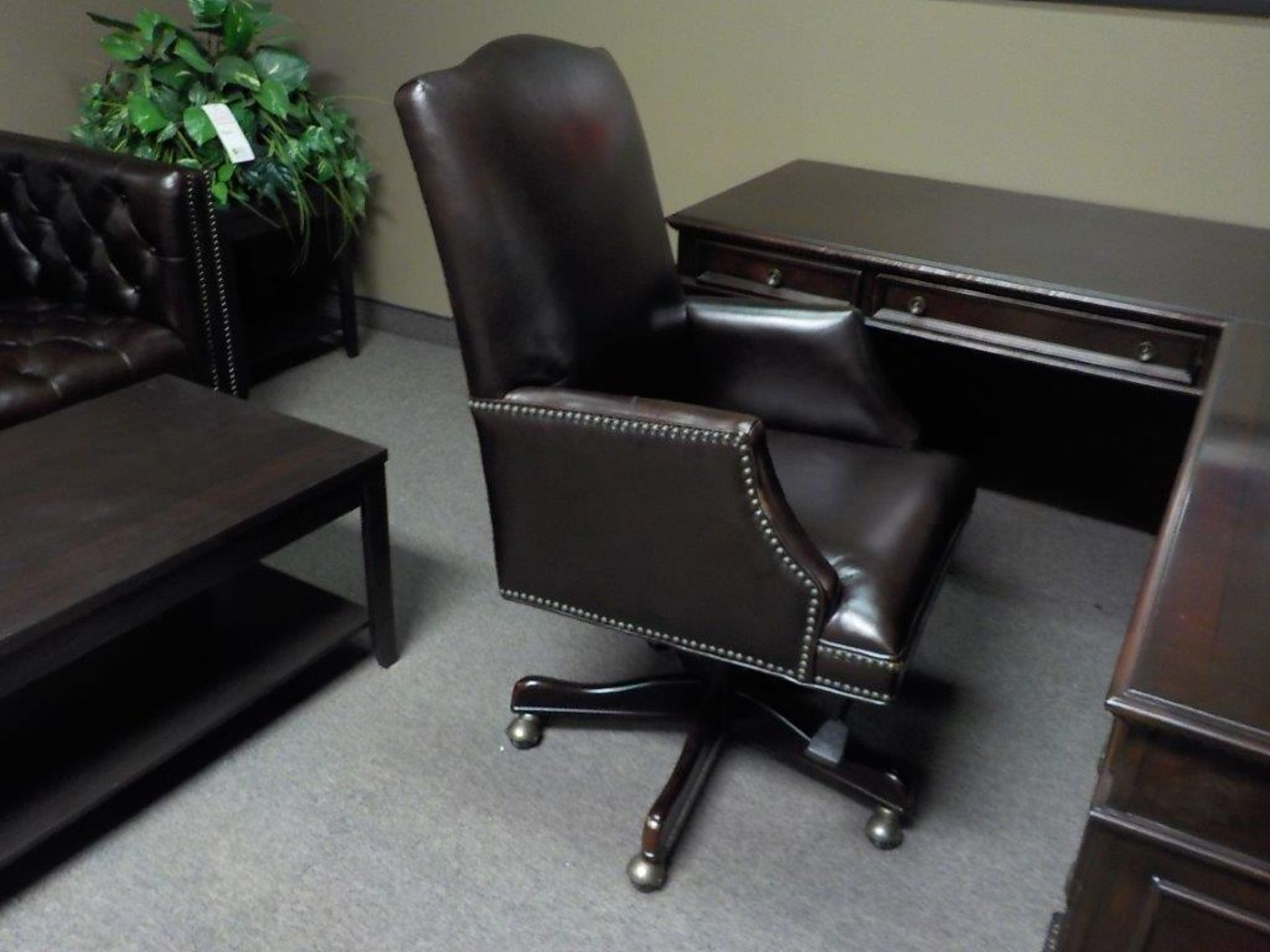 BROWN LEATHER EXECUTIVE ARMCHAIR