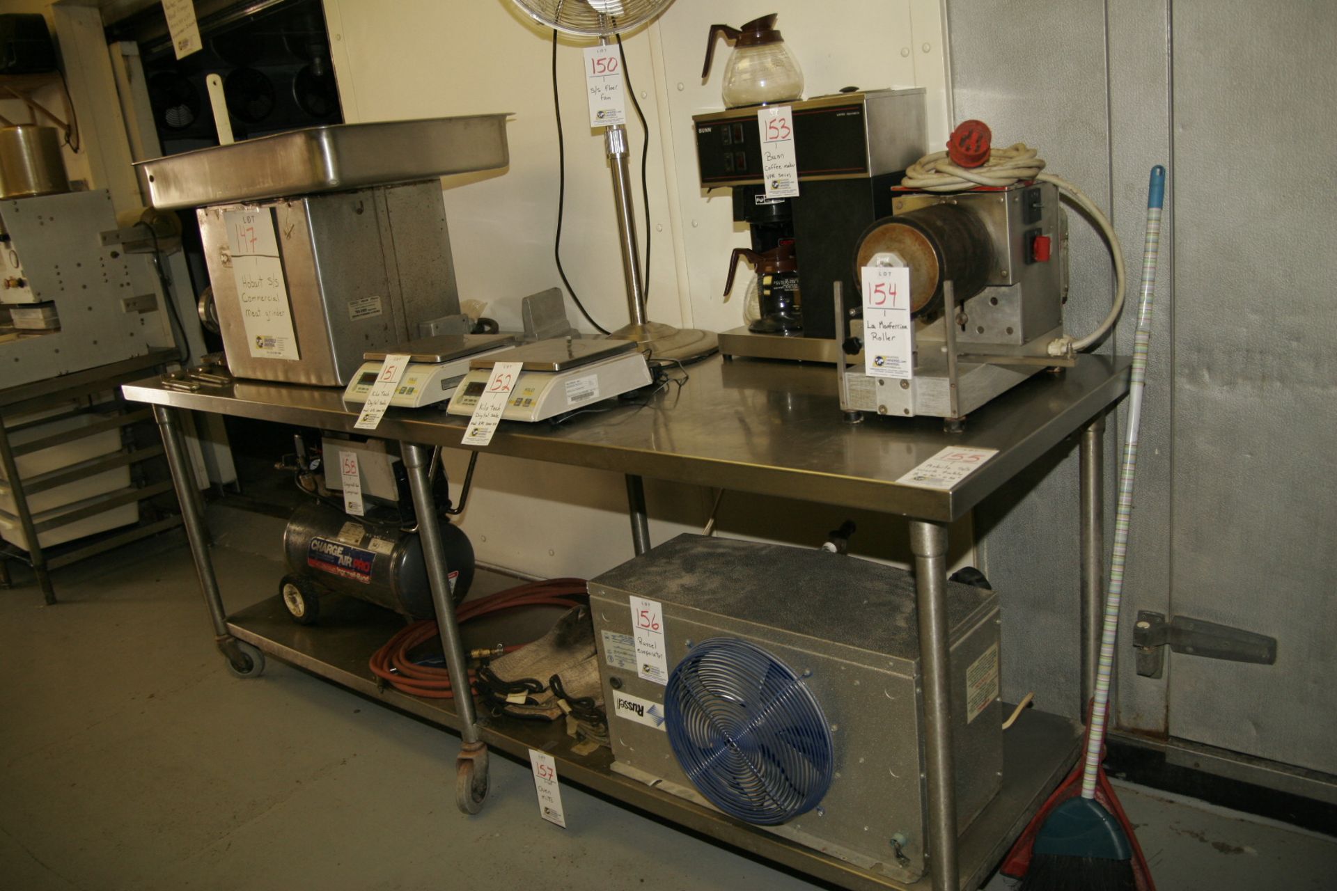 Mobile stainless steel work table 8'x30"x36"