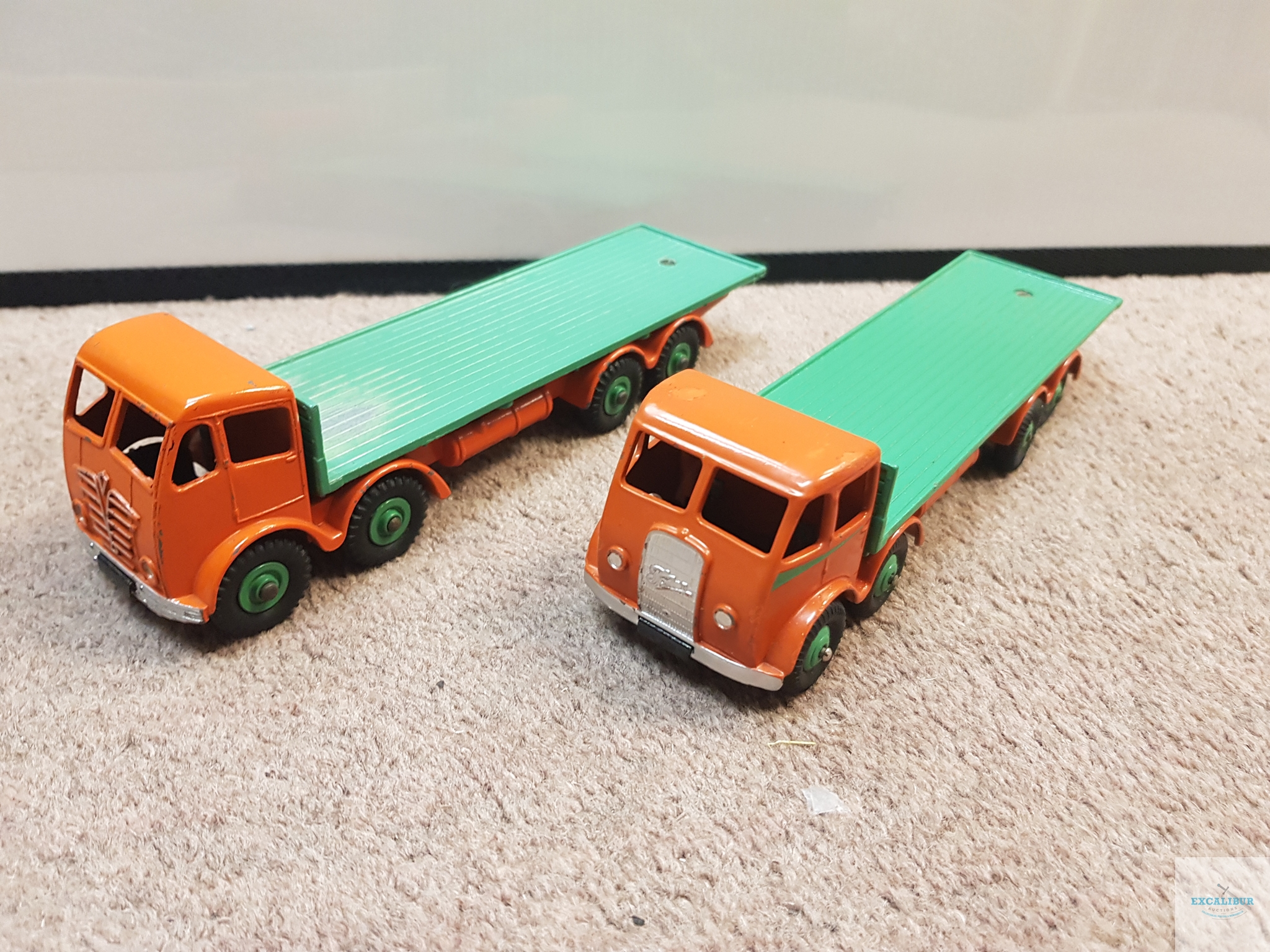 PAIR OF DINKY 502 FLAT BED FODENS - comprising styles with first and second series cabs - both in