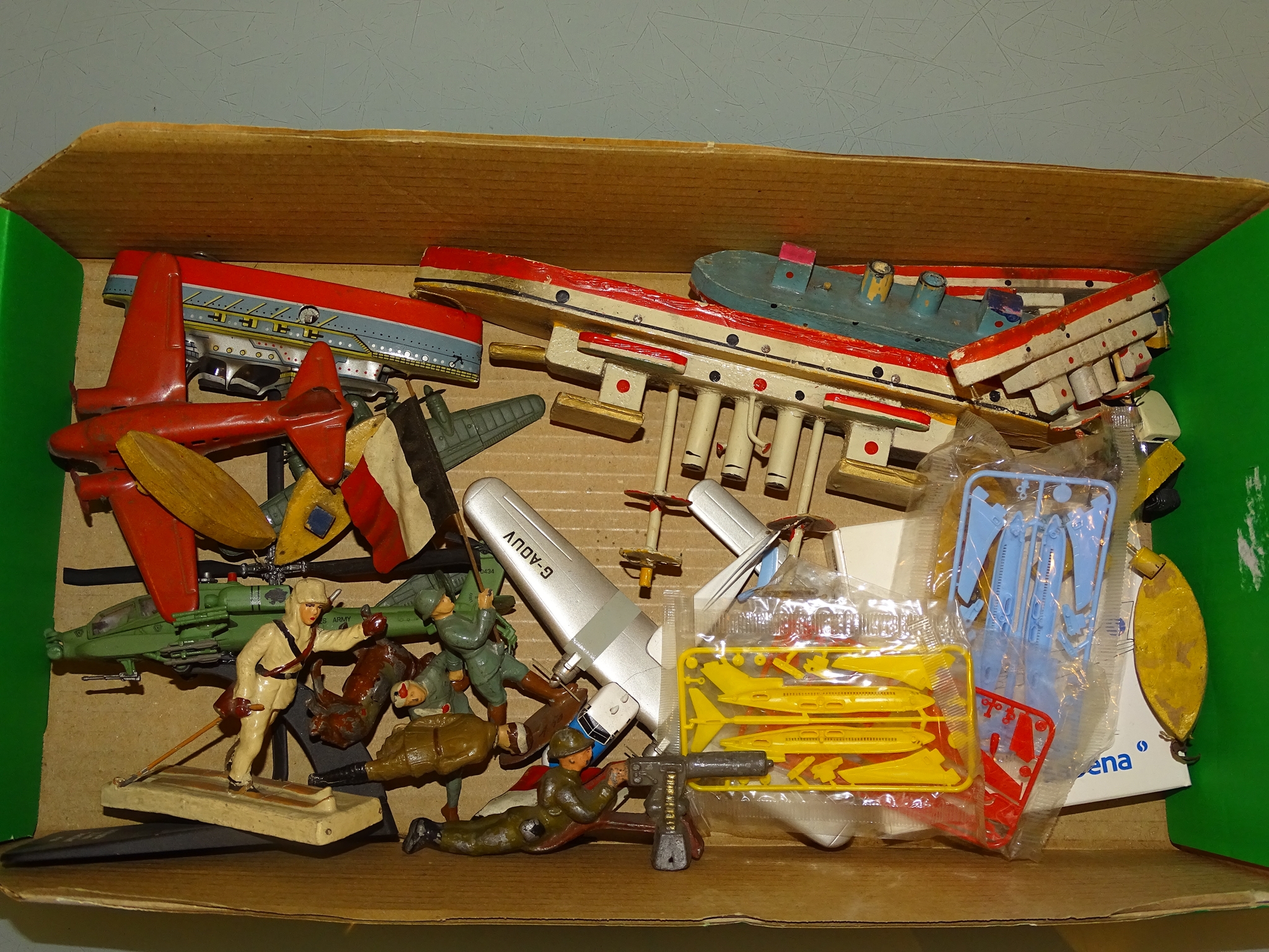 A collection of tinplate toys, together with some wooden ships and lead figures as lotted - F/G -