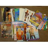 A large quantity of 'Film Review' magazines and DISNEY story books, programmes etc together with a