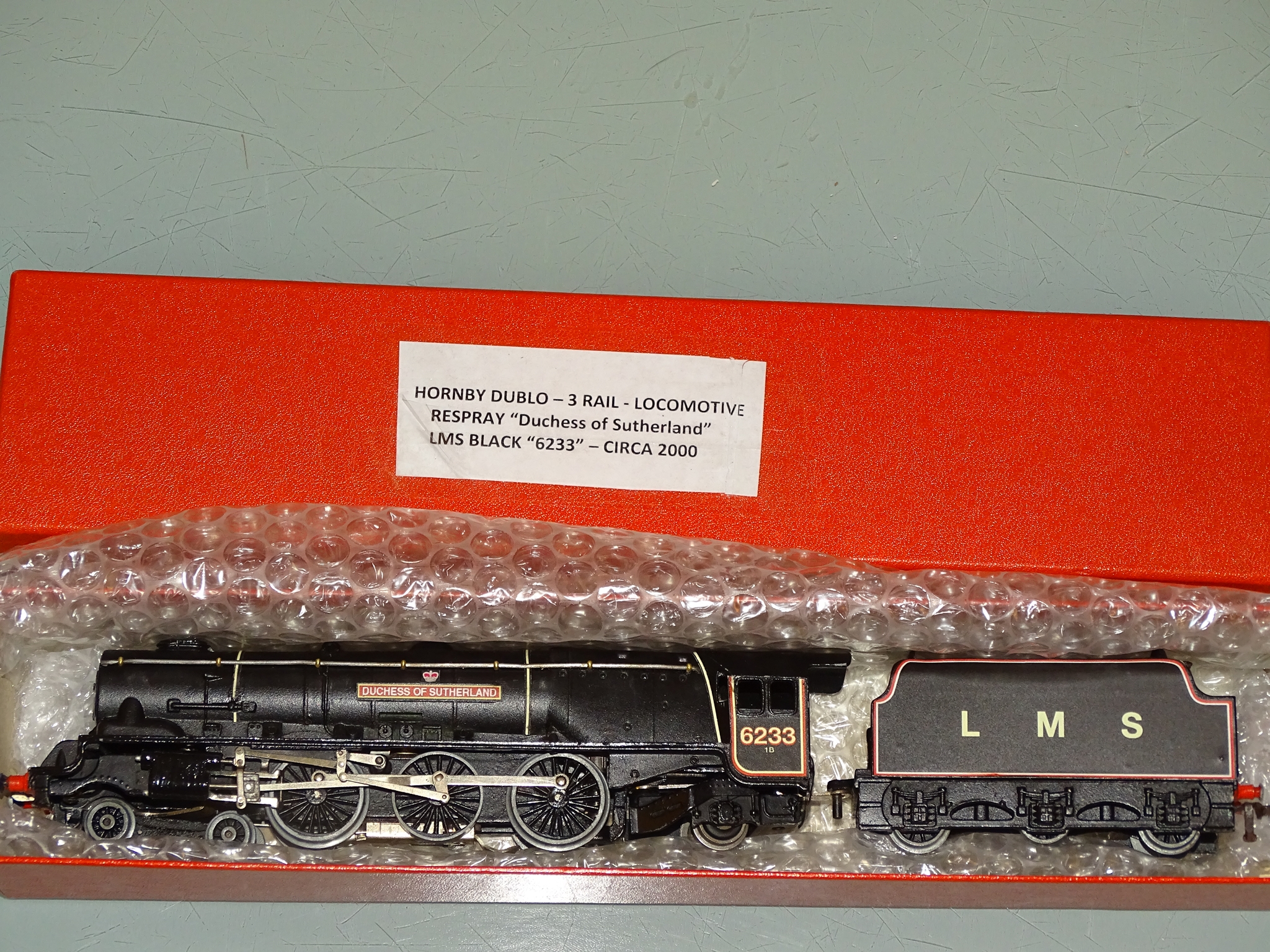 A HORNBY DUBLO 3 rail Duchess Class locomotive professionally resprayed in LMS black livery as '