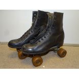 A pair of adult sized vintage leather roller skates from 1950s/60s, size 6 - some rust to metal