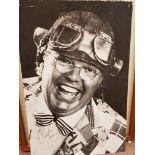 A large board mounted photograph of ROY CHUBBY BROWN signed to front - provenance: Removed from