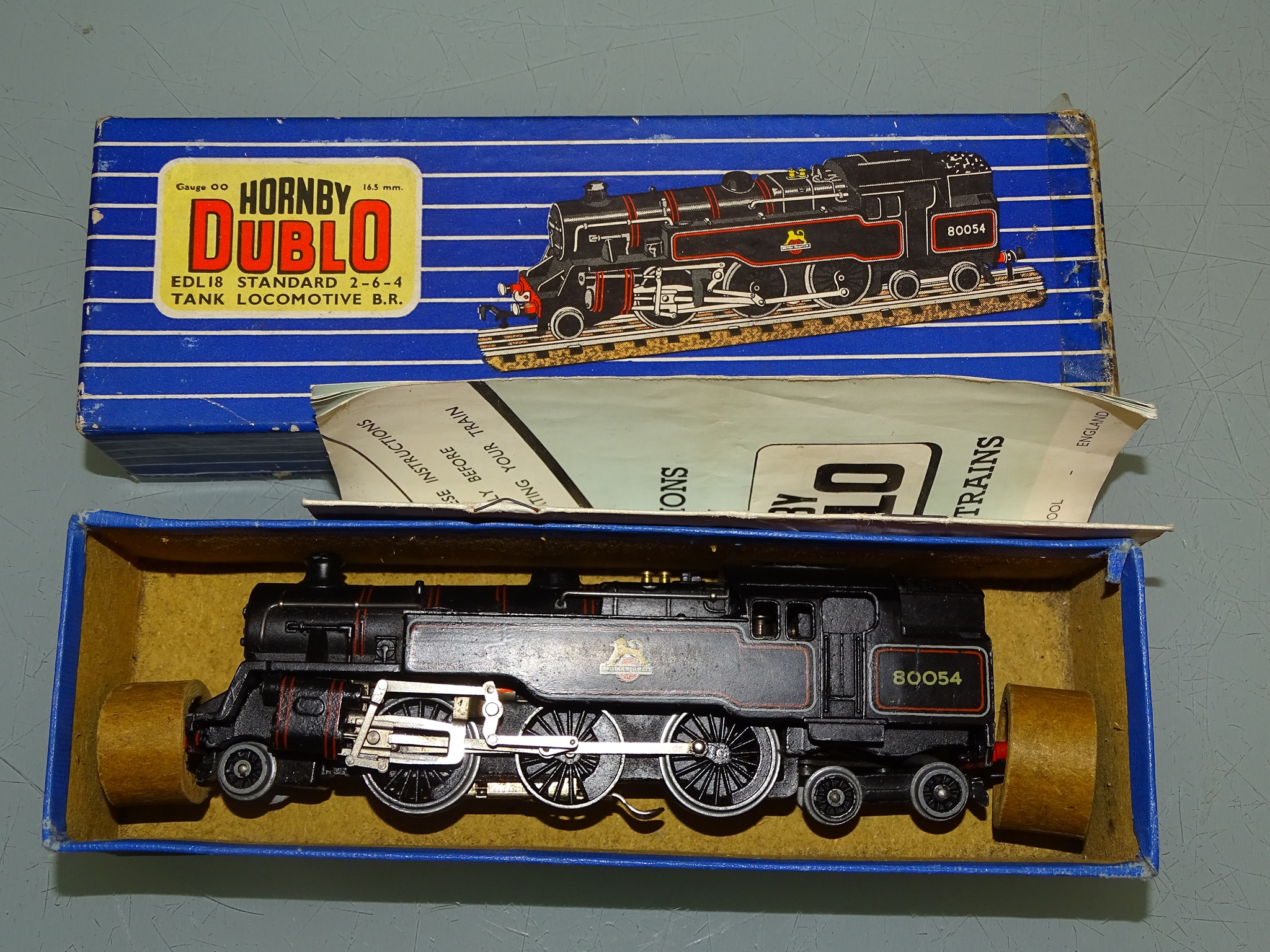 A HORNBY DUBLO 3 rail 2-6-4 EDL18 tank locomotive in BR black livery numbered 80054 - F/G in F