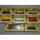 A group of wagons and vans by WRENN Railways to include Kellog's and Quaker Oats examples - G/VG