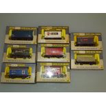 A group of wagons by WRENN Railways to include Standard Fireworks, Eskimo and Robertsons