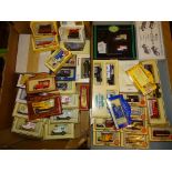A large quantity of promotional cars, vans and buses by Lledo, Matchbox Models of Yesteryear and