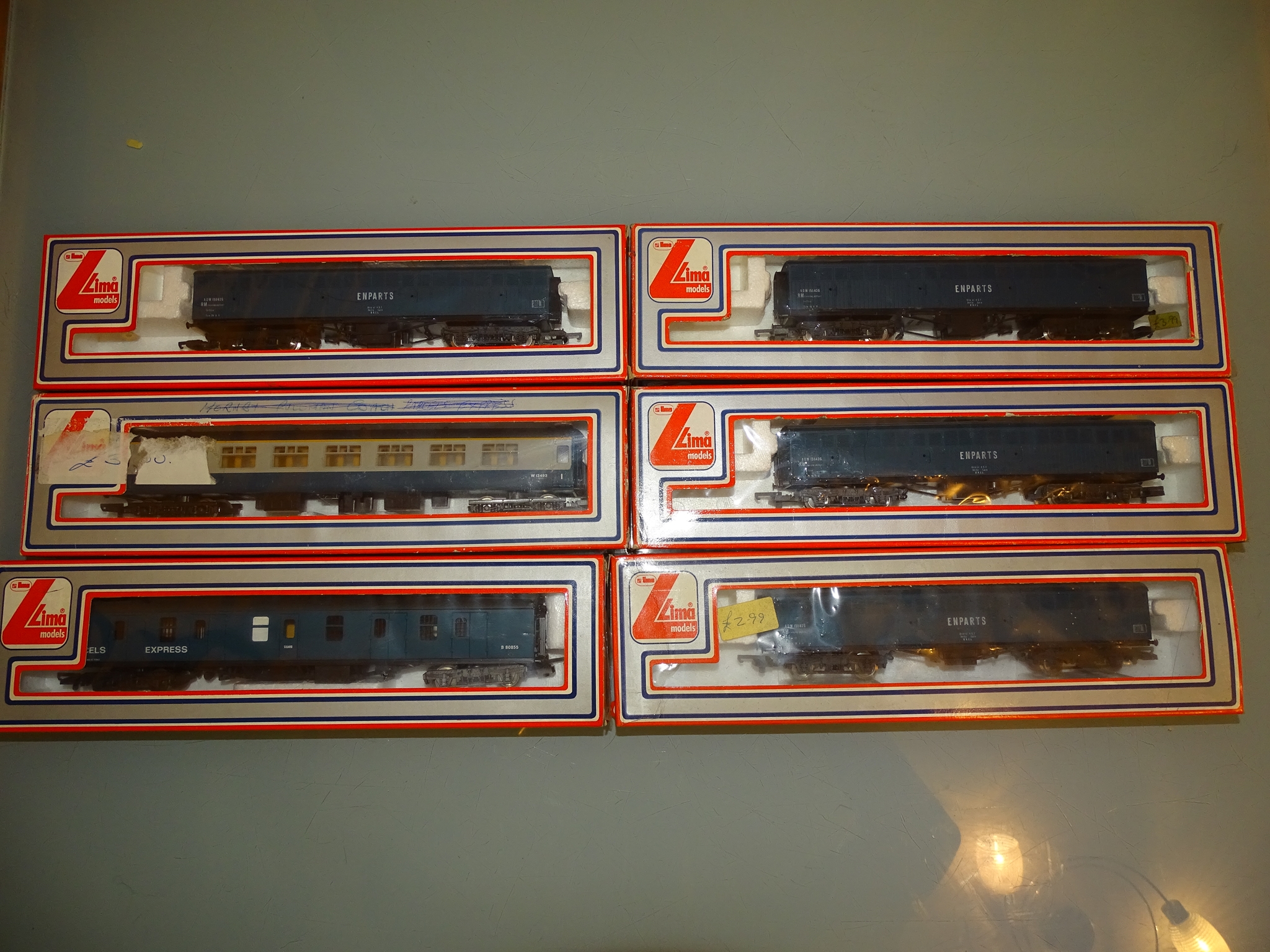 A group of coaches and parcels vans by LIMA as lotted - G/VG in F/G boxes (some graffiti to one box)