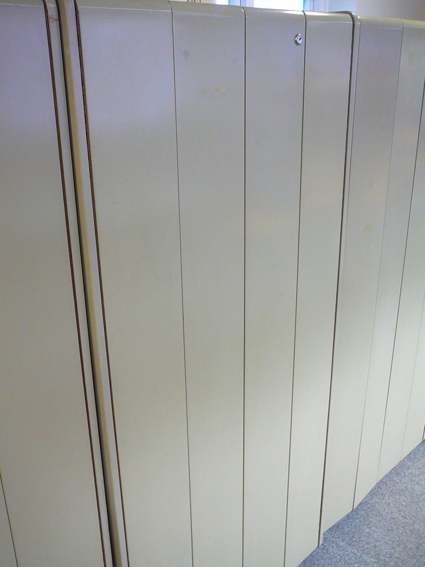 Grey filing cupboard with bi-fold doors