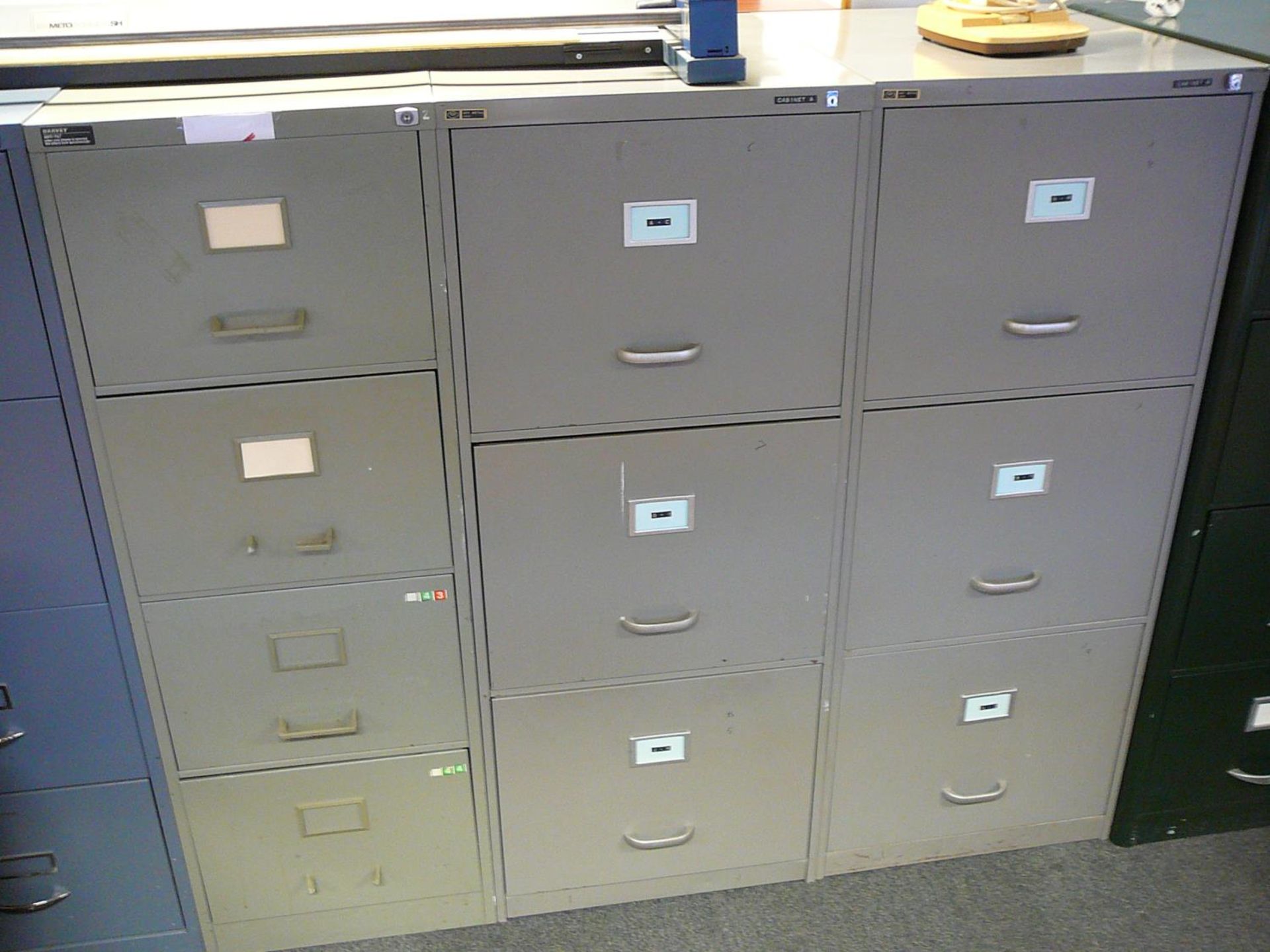 Three drawer filing cabinet in grey