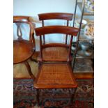 Pair of Victorian mahogany bar back cane seated chairs