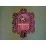 Pair of cast iron framed mirror candle sconces