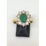 18ct gold emerald (1.50ct) and diamond (0.98ct) diamond cluster ring (sz N)