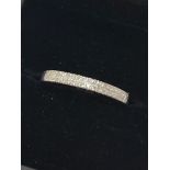 9ct white gold double channel set diamond (0.12ct) ring (sz P.5)