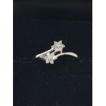 9ct white gold diamond (0.15ct) floral cluster ring (sz O)