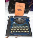 1950s portable Corona typewriter in blue with case and manual