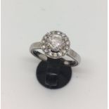 18ct white gold halo ring (1.23ct in total, centre stone 0.97, colour I, P1 clarity)(sz N)