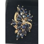 9ct gold sapphire and diamond cluster ring (sz O.5)