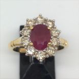 18ct gold ruby (1.50ct) and diamond (1.0ct) diamond cluster ring (sz N)