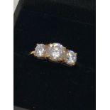 9ct gold CZ trilogy ring (sz O.5)