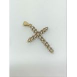 9ct gold and diamond set cross pendant