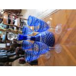 Blue glass decanter and six matching glasses