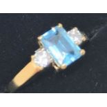 9ct gold blue topaz and CZ ring