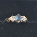 9ct gold blue topaz and diamond ring