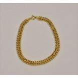 Asian gold patterned earrings. 18ct non-hallmarked double link bracelet