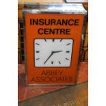 Double-sided hanging Abbey Assocates Insurance Centre Clock