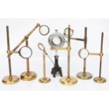 A Collection of Seven Large Microscope Bullseye Condensers,