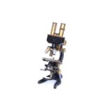 A Leitz Binocular Microscope,