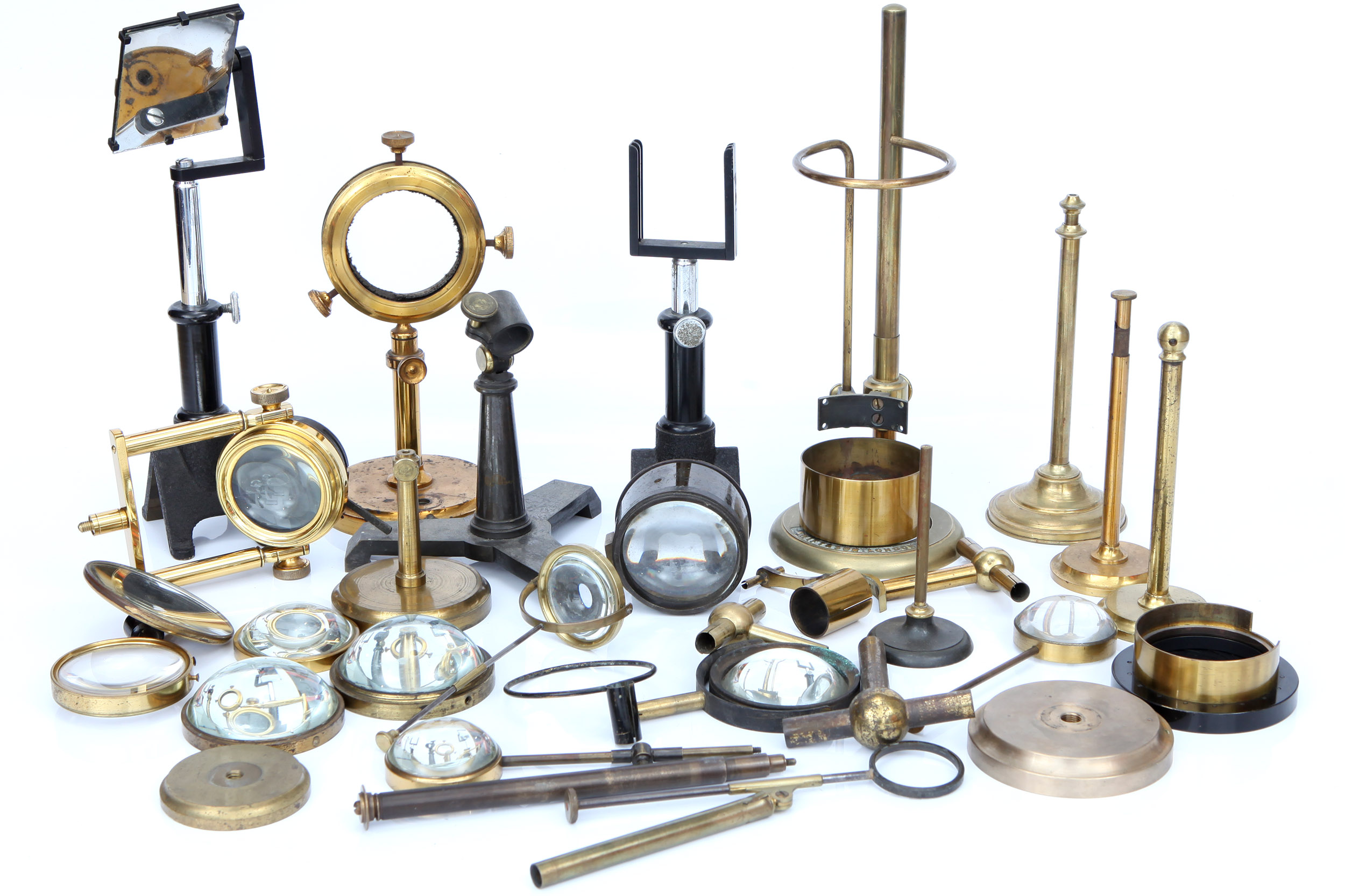 A Large Collection of Microscope Bullseye Condensor Parts,