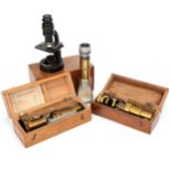 A Collection of Four Smal Microscopes,