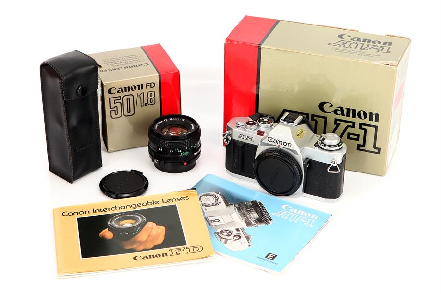 A Canon AV-1 SLR Camera,