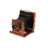 A Sharp & Hitchmouh Half Plate Mahogany Field Camera,